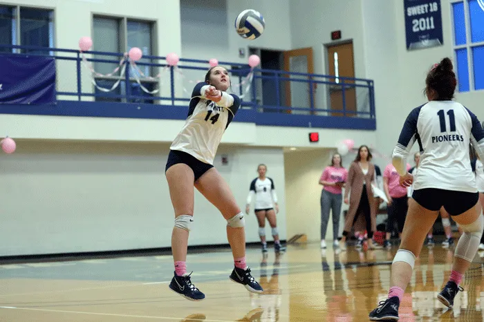 Volleyball player hitting the ball