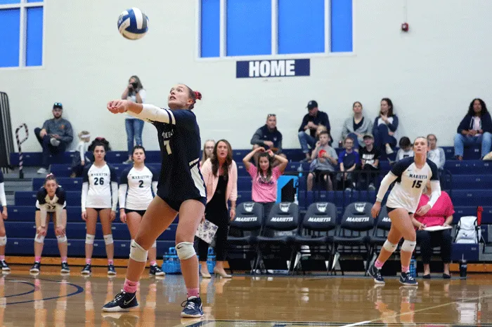 Volleyball player setting a shot