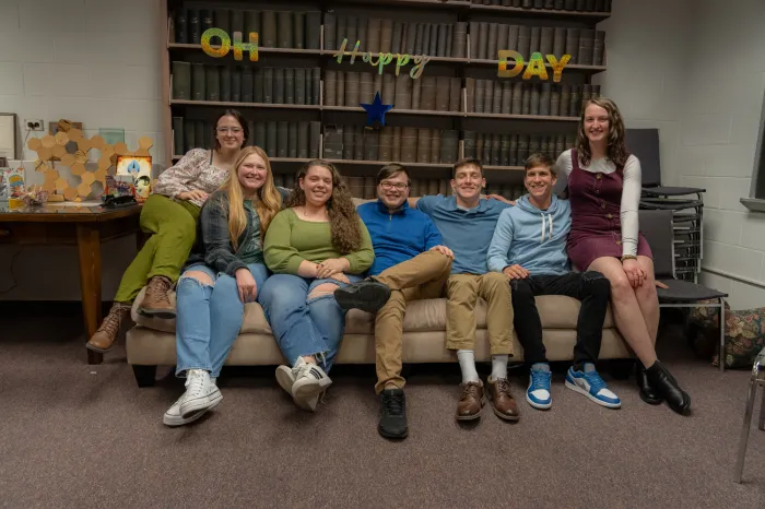 Biochemistry students sitting on a couch