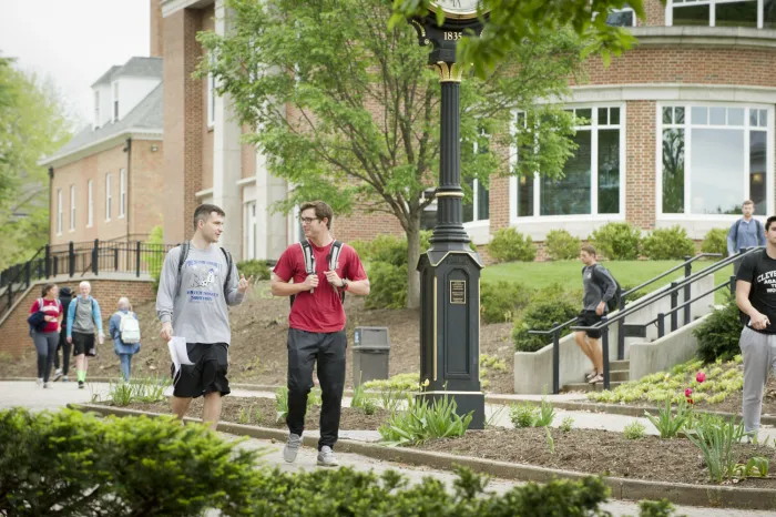 Students walking down the College mall
