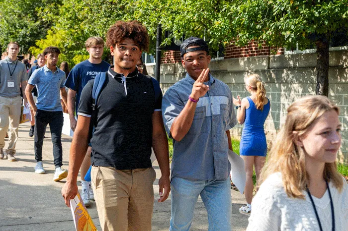 Students smiling, walking