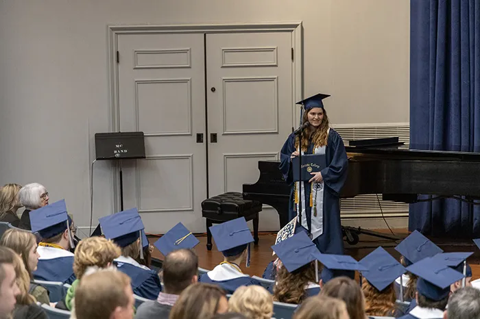 Alison Loase speaking at graduation
