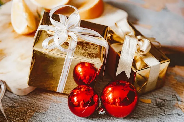 Christmas presents wrapped in gold