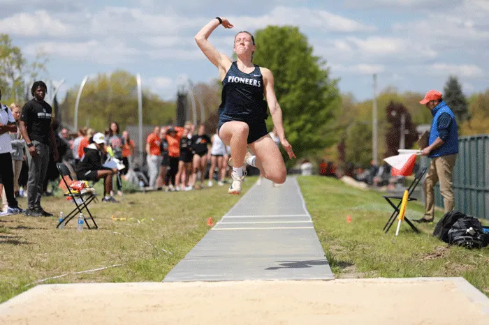 Athlete competing in the long jump