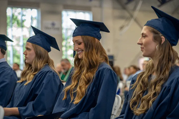 Student smiling at graduation