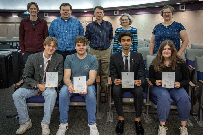 Student inductees with the Physics faculty