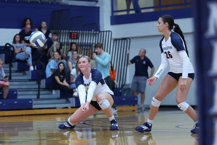 Volleyball player making a dig