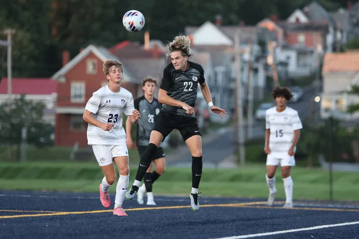 Soccer player heading the ball