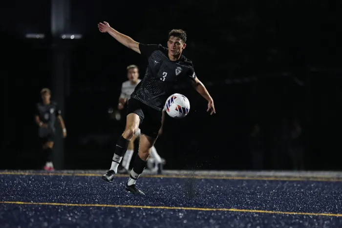 Soccer playing getting the ball under control