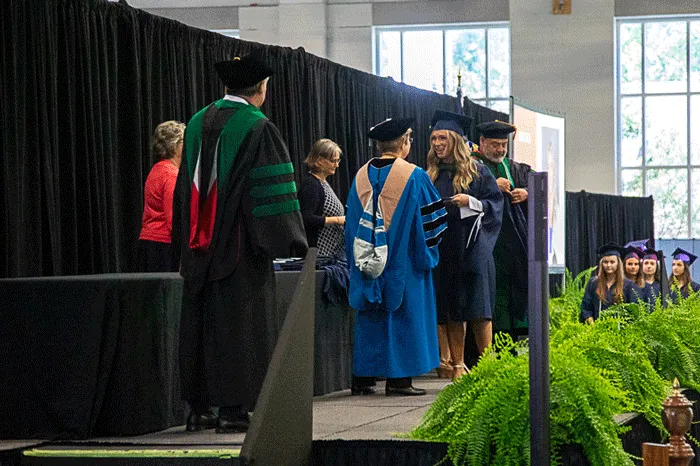 PA student receiving diploma