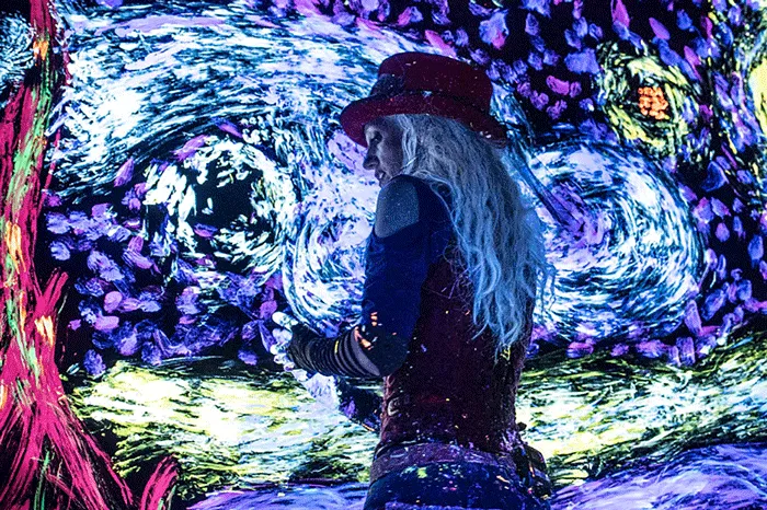 Woman painting during Artrageous