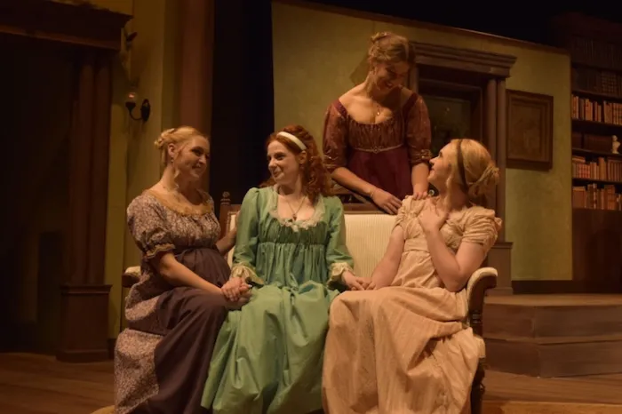 Theatre students acting.