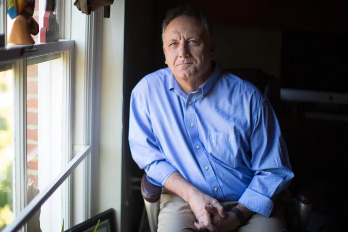 Bill Bauer sitting in his office