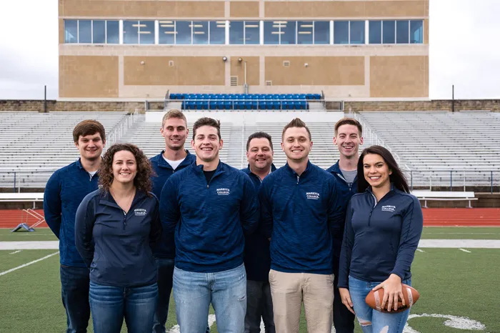 Students with Professor Smith at Don Drumm Stadium