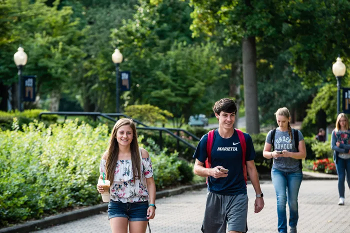 Students walking along The Christy Mall