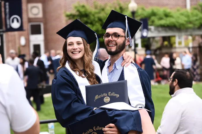 Marietta College graduates celebrate following the Commencement ceremony