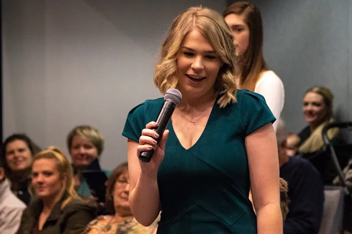 April Bartenschlag speaks during the December 2018 graduation