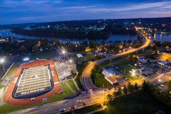 Night aerial photo of Don Drumm Stadium with the lights on