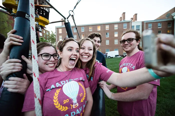 Students taking a selfie on the hot air balloon