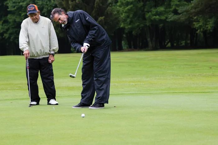 Joe Bergin putts during the annual Pioneer Challenge in Pennsylvania