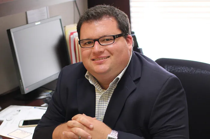 Jarrett Stull sitting at his desk