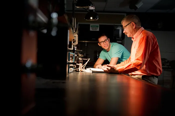 Professor and student working together in a lab