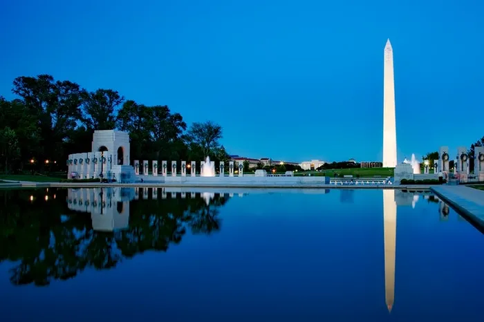 Washington DC Washington Monument with the WWII memorial in the foreground
