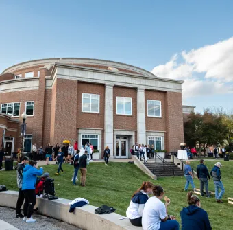 Marietta College students, faculty, staff, and alumni enjoy a barbecue during Homecoming