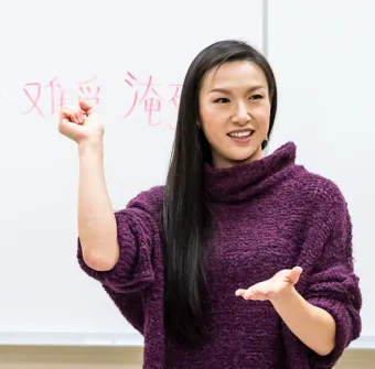 Asian Studies professor speaking with students