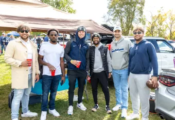 Marietta College alumni pose for a photo during homecoming