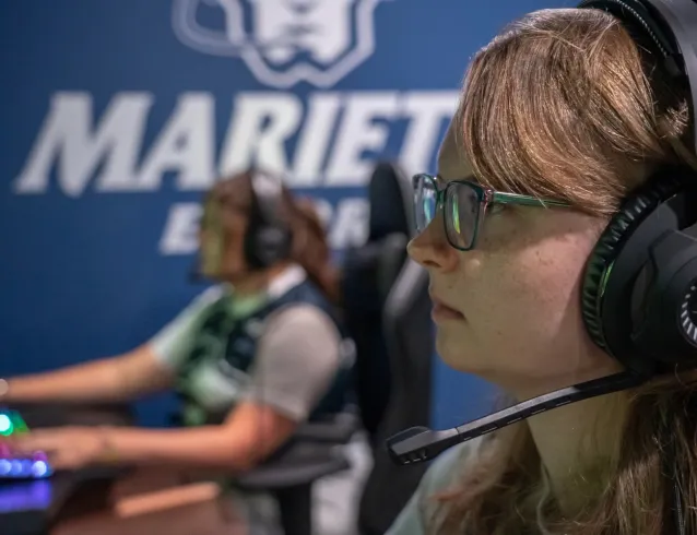 esports player at a computer monitor