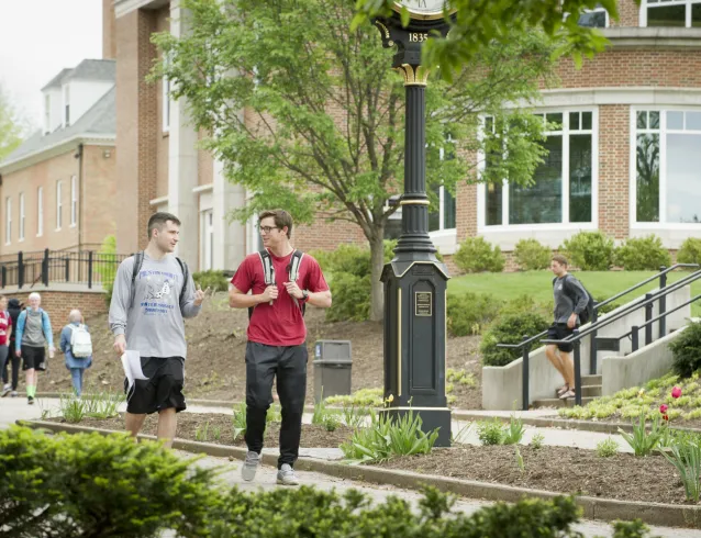 Students walking down the College mall