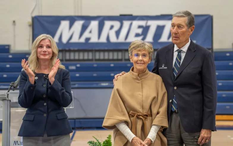 Joe and Linda Chlapaty  with President Kathleen Dougherty