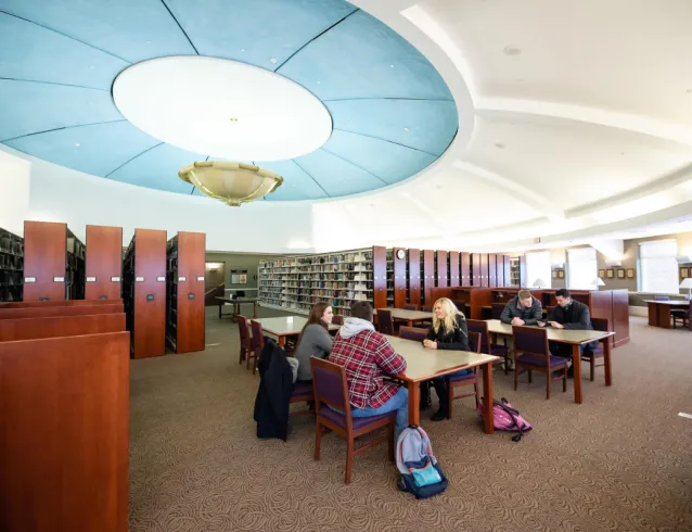 Students studying in Legacy Library