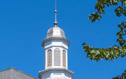 McDonough Center Spire against a blue sky