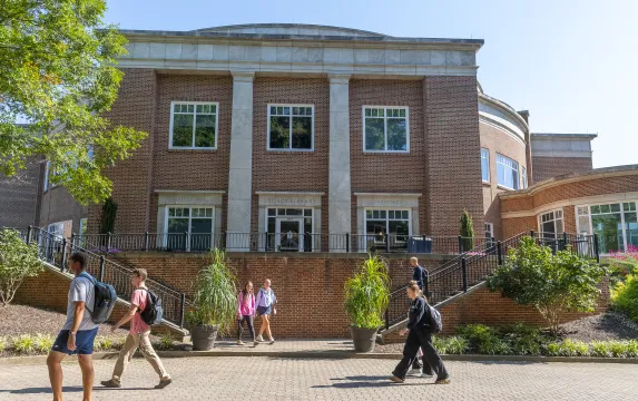 Marietta College students walk on campus near the Legacy Library