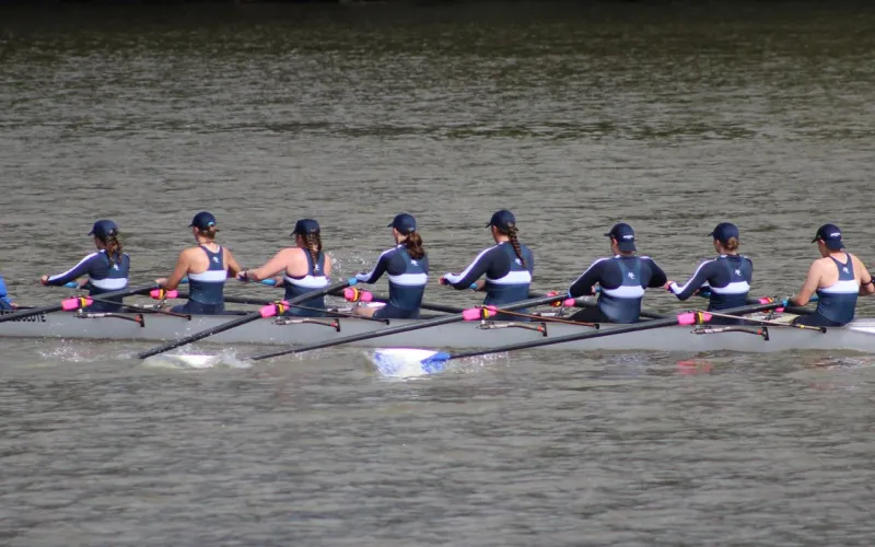 Marietta College Women's rowing team on the water