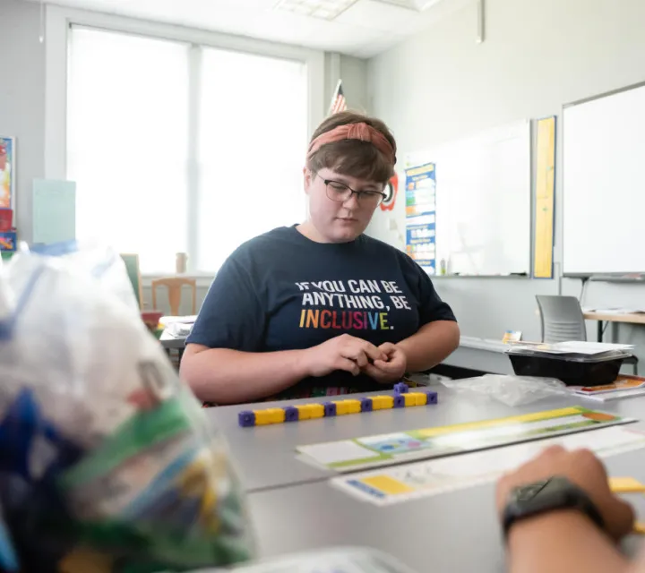 A Marietta College Education student wearing an inclusive shirt