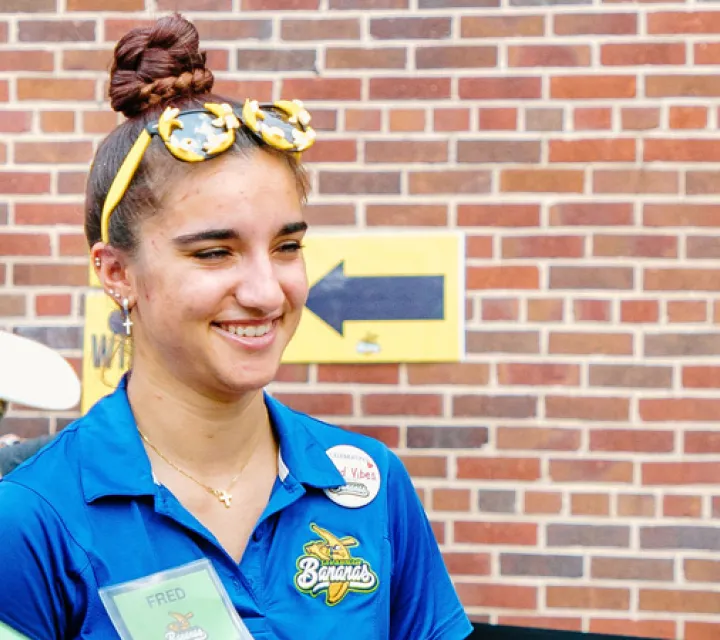 Female student interning with Savannah Bananas