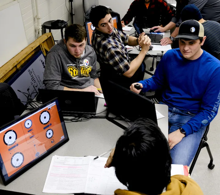 Energy Systems Studies minors interact with a drill simulator during class