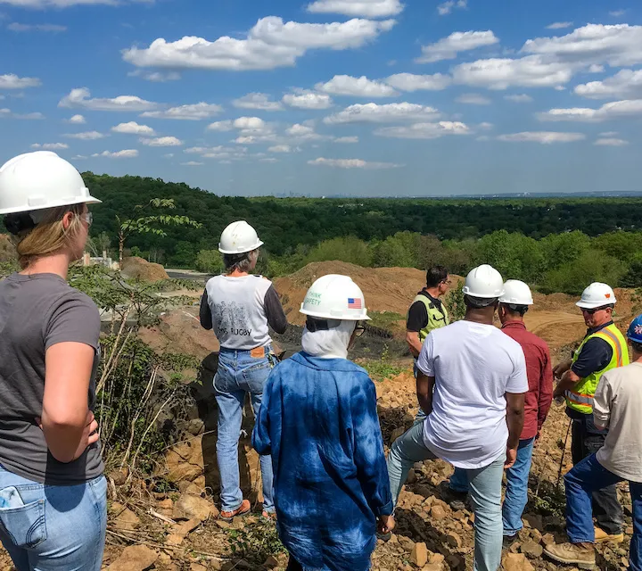 Land and Energy Management majors standing outdoors