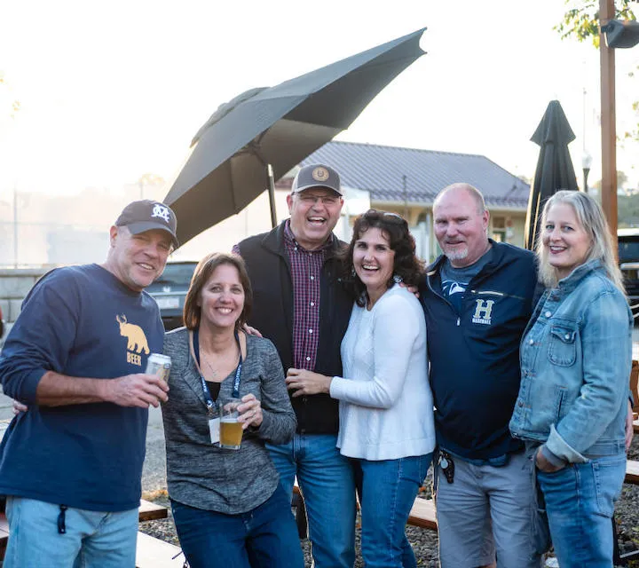 Marietta College alumni pose for a photo during homecoming