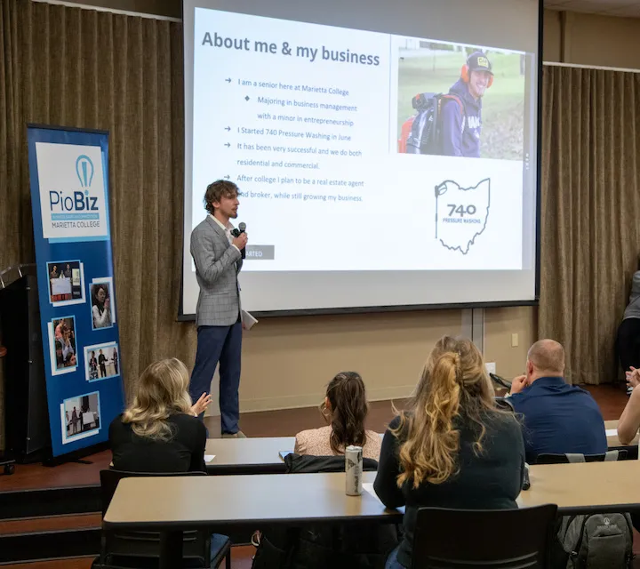 A Marietta College student presents during PioBiz