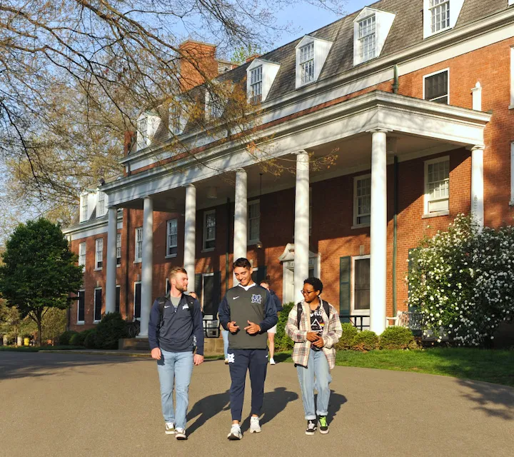 Marietta College students walk in front of Marietta Hall