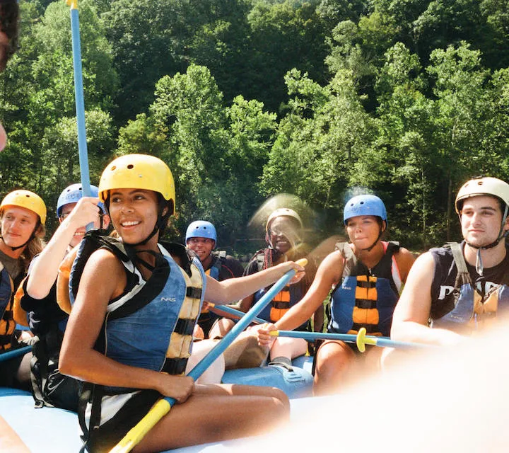 Marietta College students on a white water raft during their FYE trip