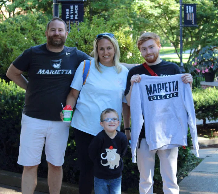 Family posing at Family Weekend