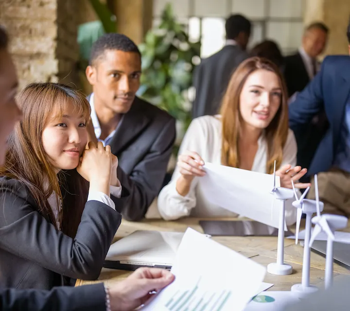 People discussing sustainability leadership