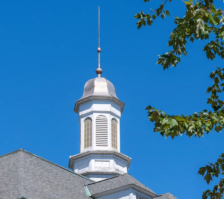 McDonough Center Spire against a blue sky