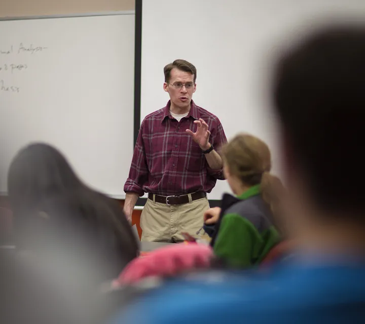 Professor at the front of the class