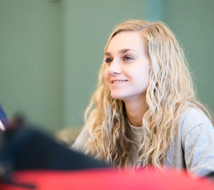 Female student listening in class